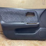 Обшивка двери передней левой (дверная карта) для Nissan Primera P11