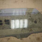 Стекло двери задней левой для Mazda 626 GE