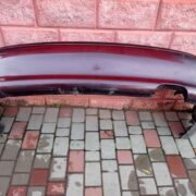 Бампер задний для Mazda 626 GE