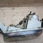 Фара левая для Mazda 626 GE