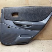 Обшивка двери задней правой (дверная карта) для Mazda 323 BJ