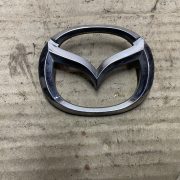Эмблема для Mazda 323 BJ